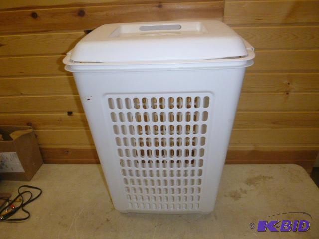 lot 5 image: 2 Bushel Clothes Hamper Has a crack on the li...