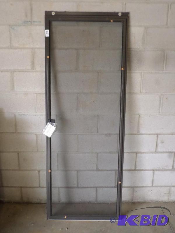 lot 65 image: Unused 29" Aluminum Framed Screen Door...