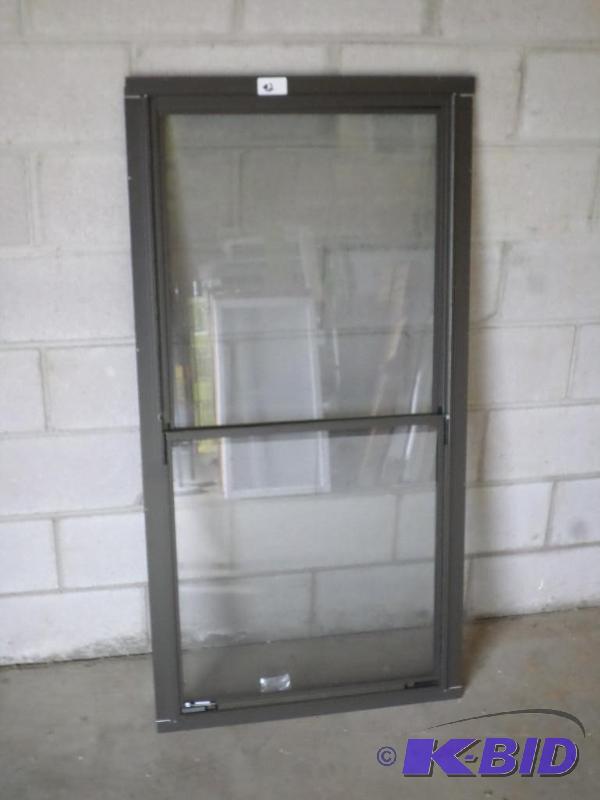 lot 92 image: New 25.75&quotx53" Aluminum Storm Door ...