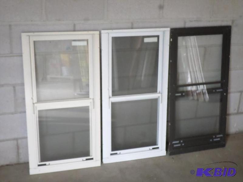 lot 93 image: (3) 17.75&quotx37.5" Aluminum Storm Doo...