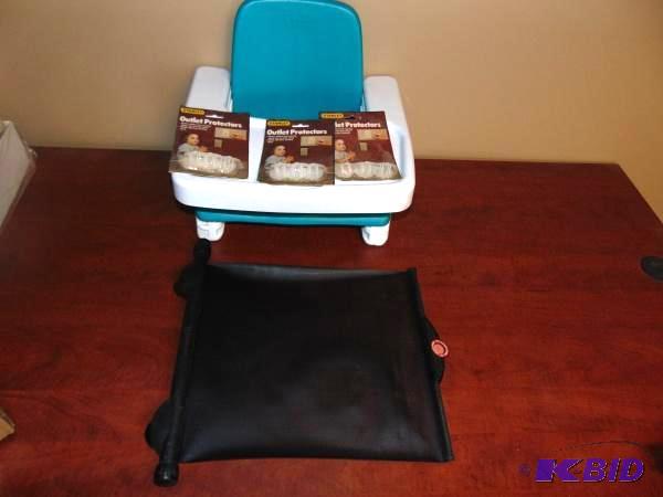 lot 24 image: Plastic Baby Feeding Chair, Outlet Plugs and ...