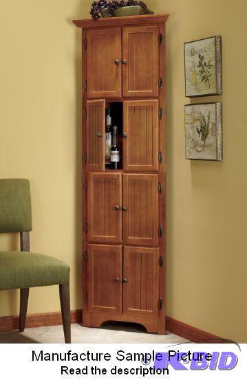 lot 16 image: Eight Door Oak Finish Corner Pantry Cabinet -...
