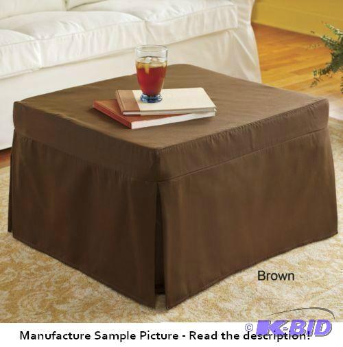 lot 23 image: Sleeper Ottoman - Has Brown Slip Cover - As a...