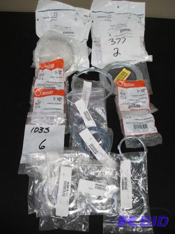 Lot of Conduit Locknuts and Pipe Clamps