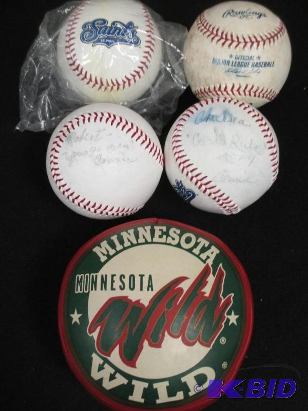 lot 00018 image: Lot of St Paul Saint baseballs and a Wilds blow up commemorative