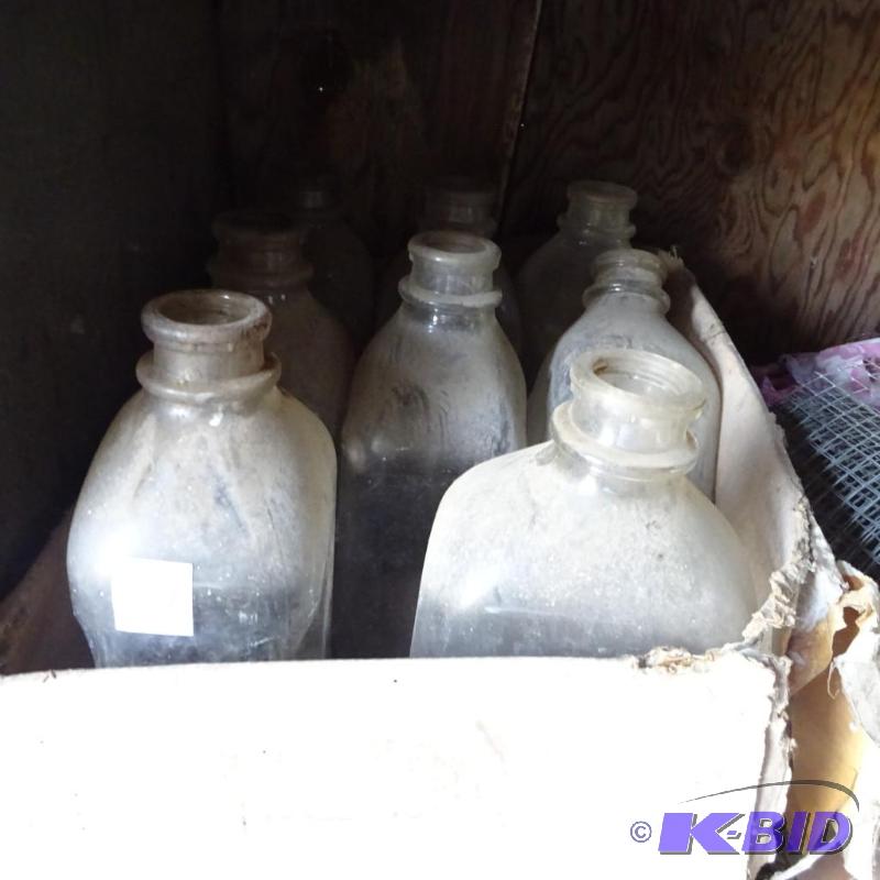 lot 257 image: 8 Vintage Glass Milk Bottles. Half Gallon Siz...