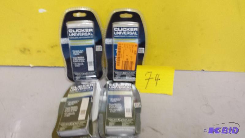 lot 74 image: Lot of 4 Clicker Universal Gar door Openers