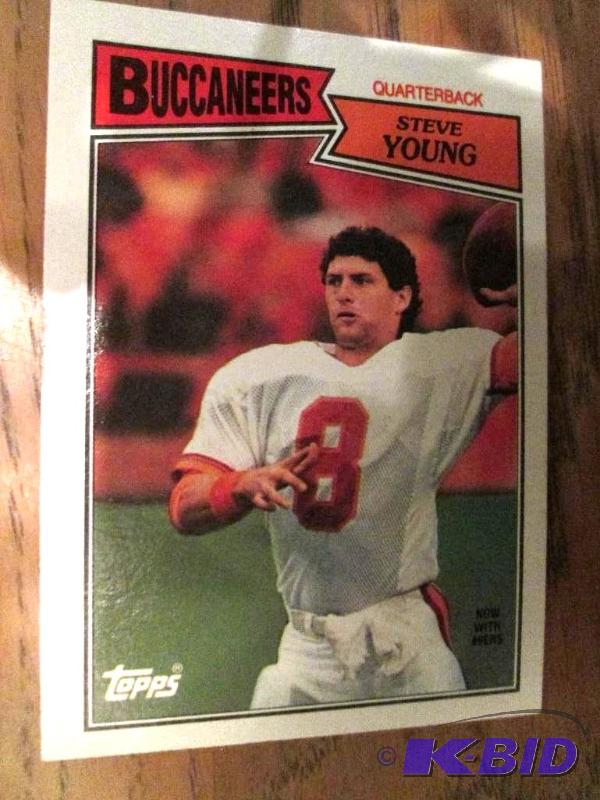 lot 117 image: 1987 Topps Steve Young collector card...