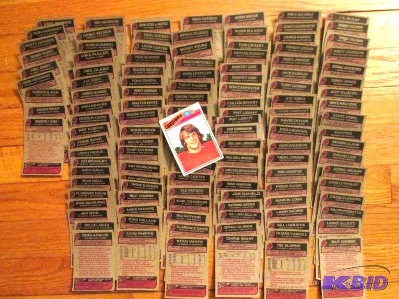lot 121 image: 125 Topps 1977 football cards...