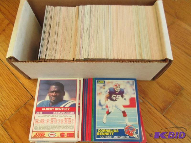 lot 21 image: Box of 1989 Score football sports cards, asso...