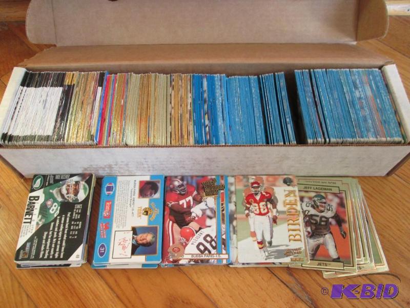 lot 23 image: Box of 1989 - 1994 Action Pack assorted footb...