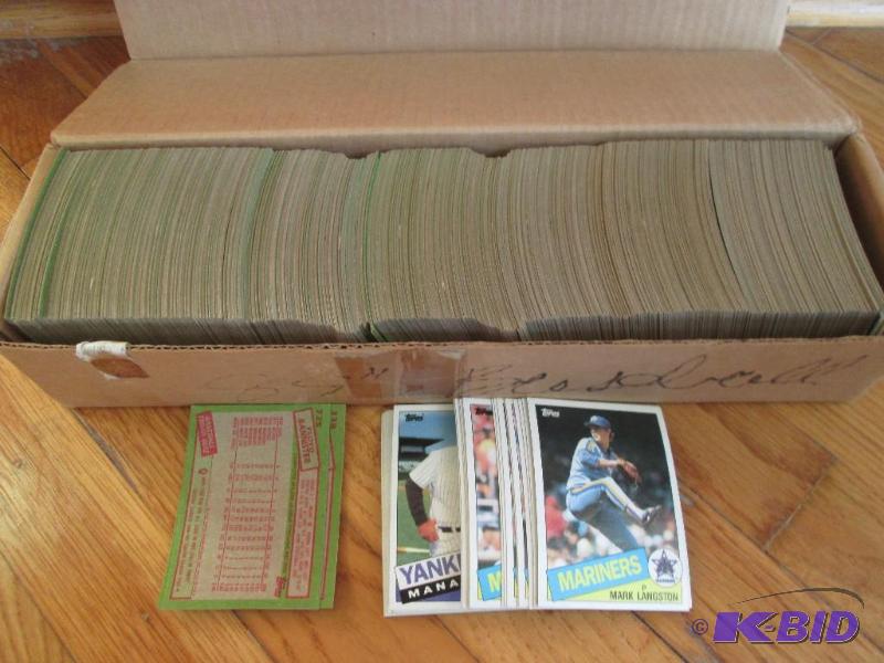 lot 24 image: Box of 1985 Topps baseball assorted sports ca...