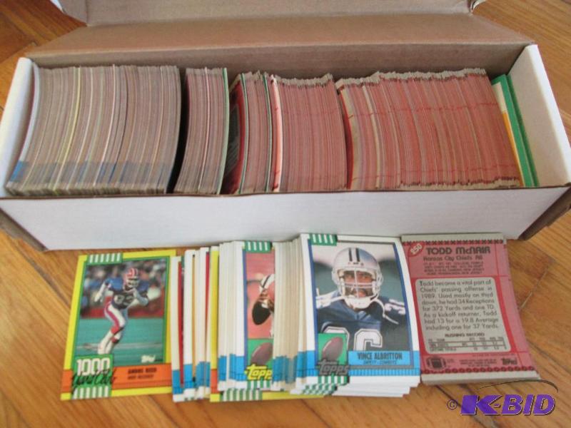 lot 26 image: Box of 1990 Topps football sports cards...