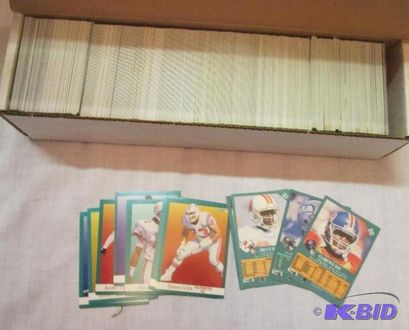 lot 30 image: Box of 1991 Fleer football sports cards...