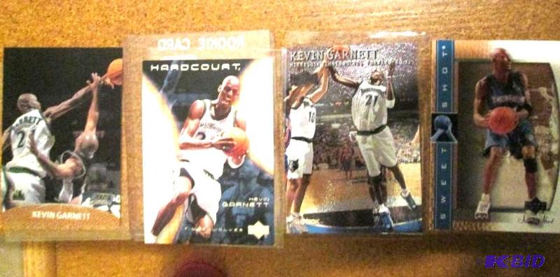 lot 38 image: 4 Kevin Garnett sports cards...