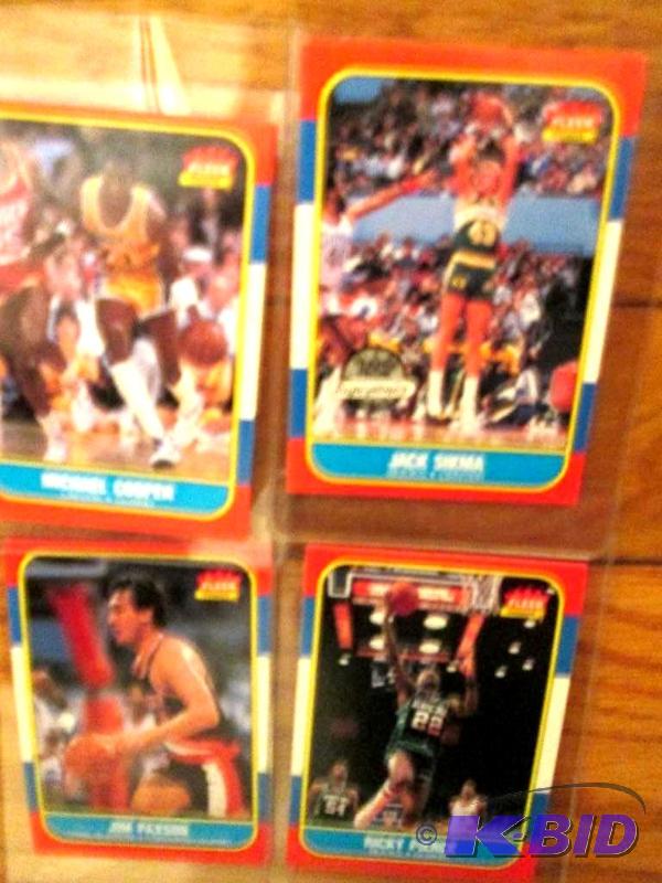 lot 41 image: 4 1986 - 1987 Fleer basketball sports cards...
