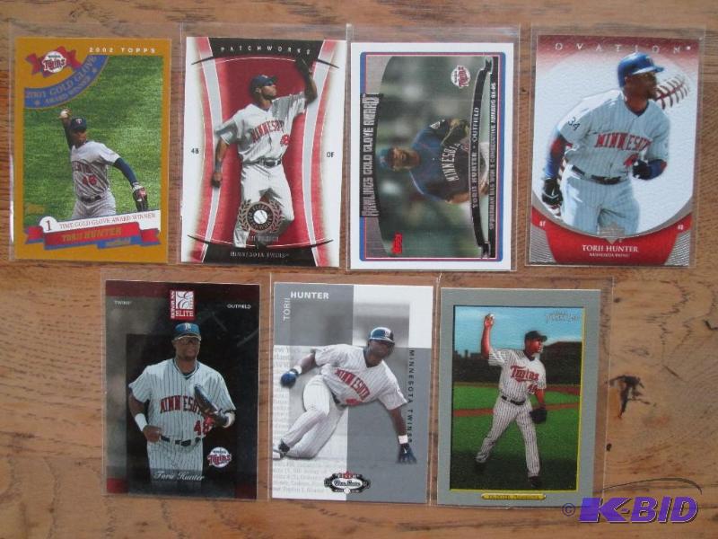 lot 57 image: 7 Torii Hunter sports cards...