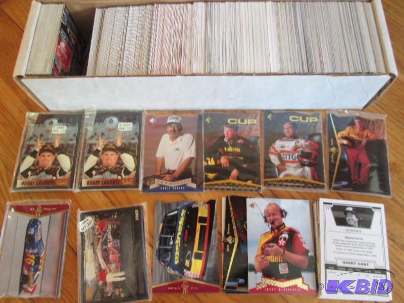 lot 83 image: Box of assorted NASCAR cards, including seper...