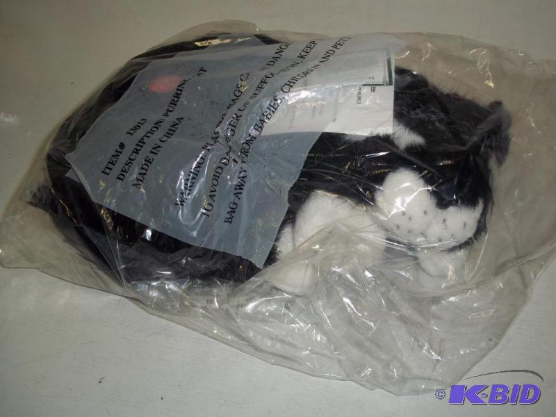 lot 102 image: Stuffed Purring Cat...