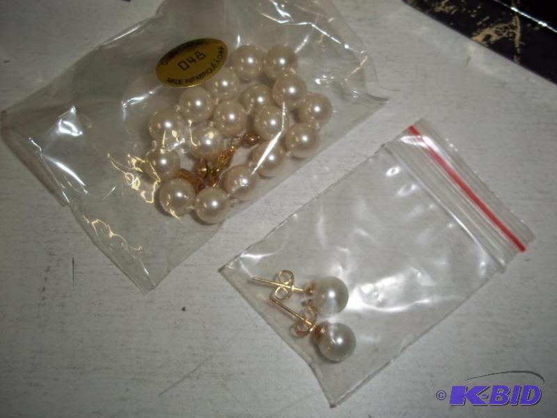 lot 105 image: White Plastic Pearl Bracklet and Earrings...