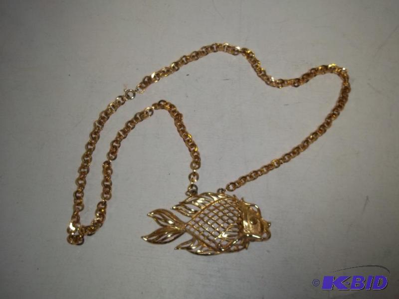lot 116 image: Gold Tone Necklace with Fish Pendant...