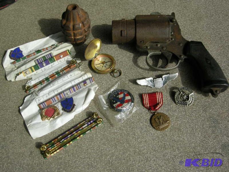 lot 66 image: Old Military items