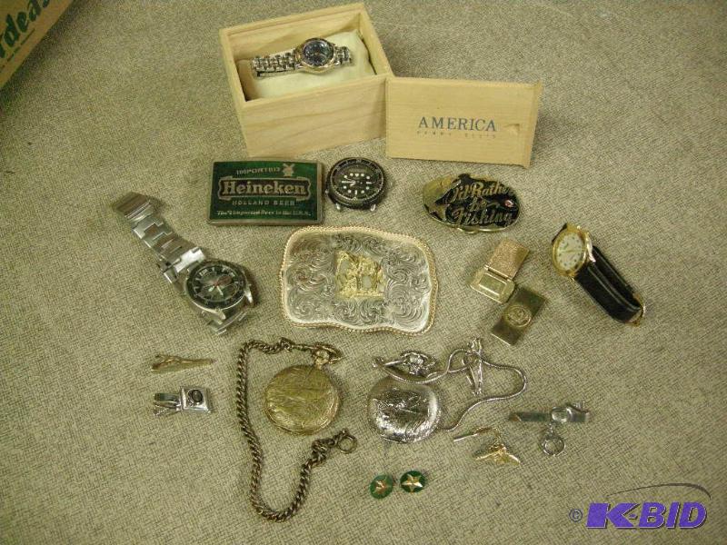lot 83 image: Belt buckles, watches, pins