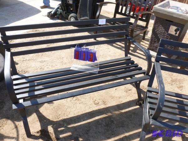 Pair of brown steel lawn benches. As shown. N...