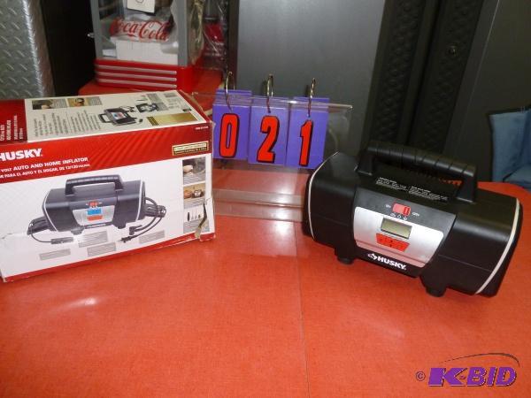 Husky 12 volt110 volt inflator. As shown. Te...