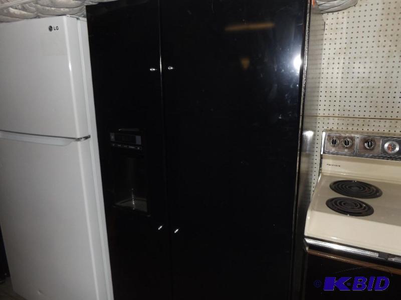 lot 119 image: LG Scratch and Dent Refrigerator, side by sid...