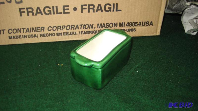 lot 252 image: Thirty (30) green sugar containers...
