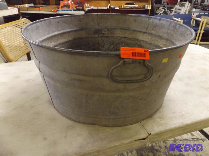 lot 160 image: Old Galvanized round wash tub...