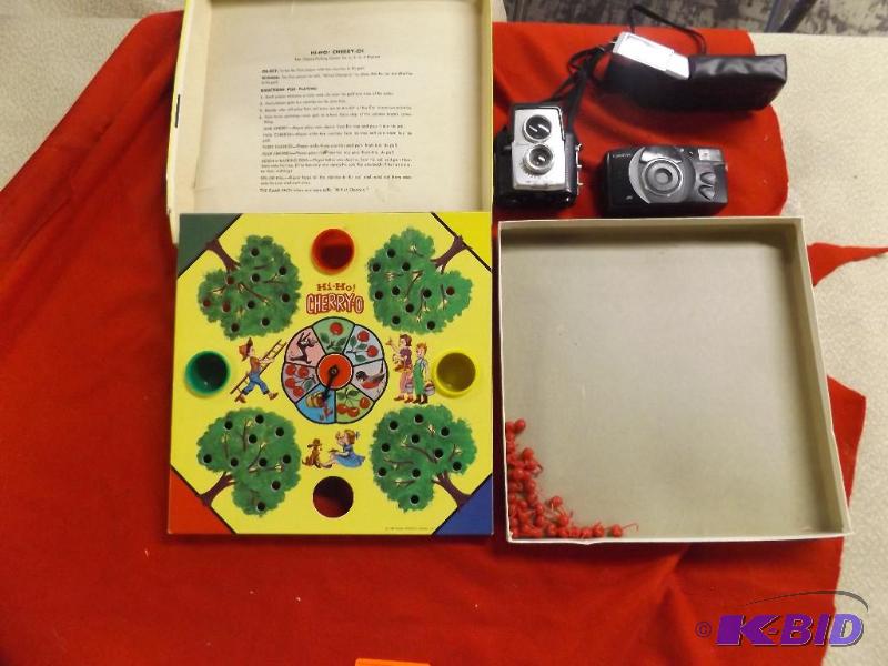 lot 185 image: Hi-Ho Cherry-O game and Two older cameras...