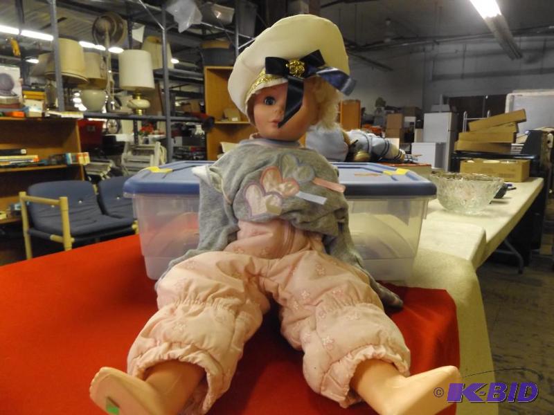 lot 195 image: Doll and 30 qt Tote...