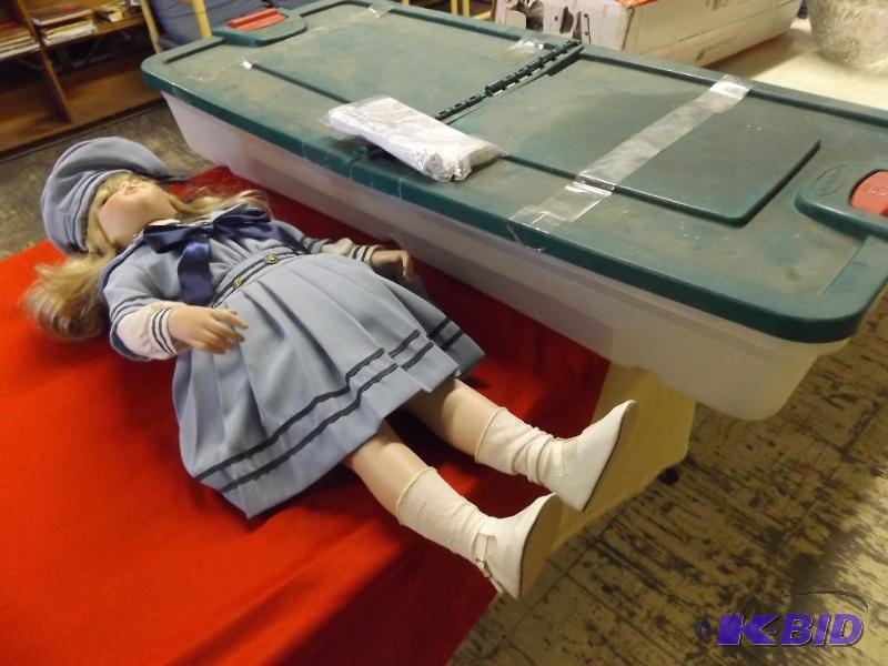 lot 196 image: Sailor Doll and under the bed storage tote...