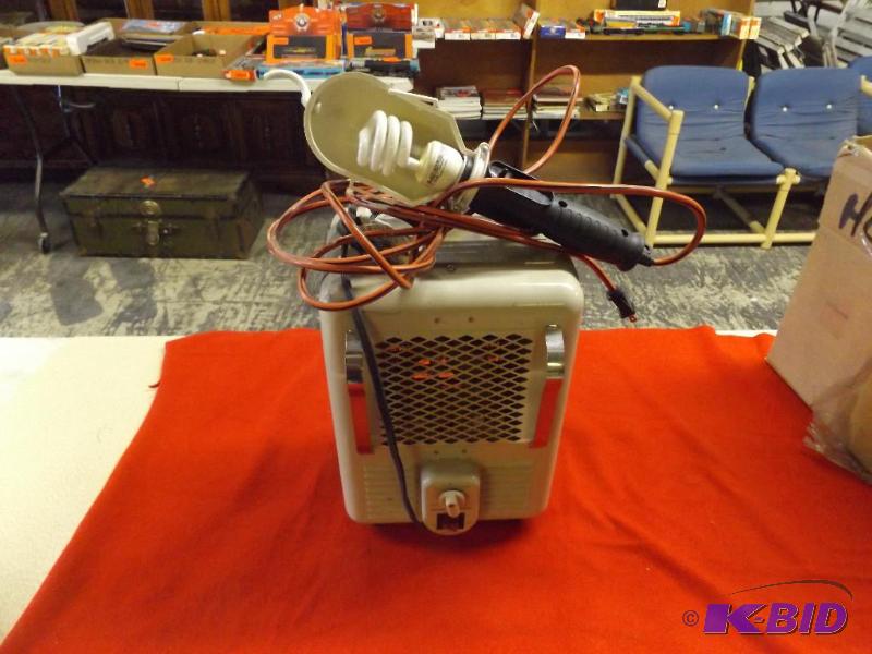 lot 208 image: Space Heater and a work light...