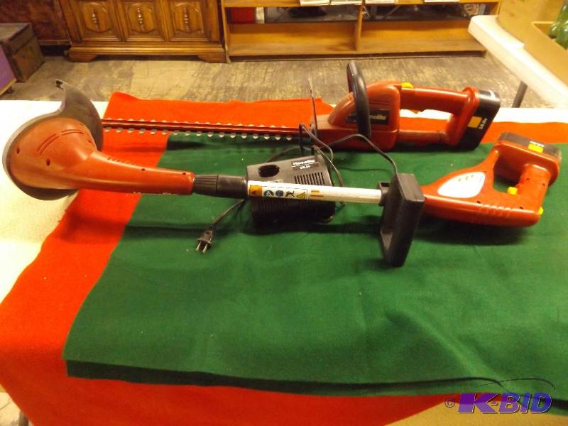 lot 65 image: Homelite Cordless Weed Wacker and Hedge trimm...