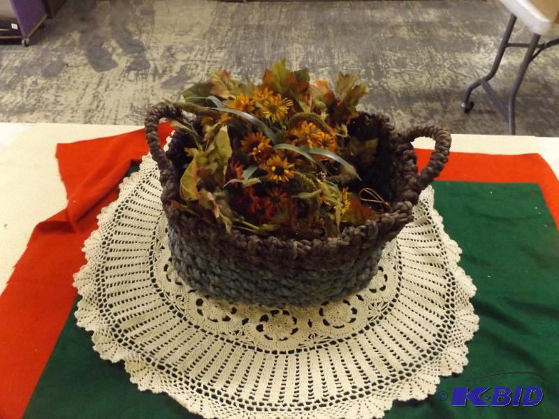 lot 73 image: Basket of artificial flowers and round doily ...