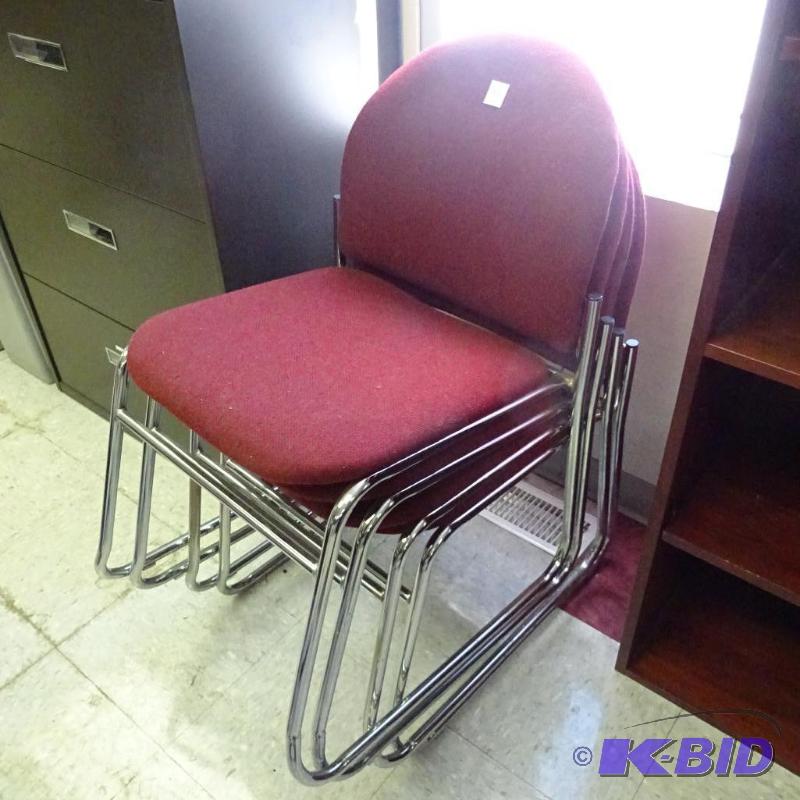 4 Metal Framed Stack Chairs...