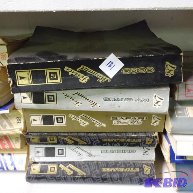 lot 121 image: Misc GM Repair Manuals...