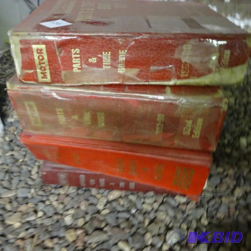 lot 126 image: Misc Motor Parts and Time Guide Manuals...