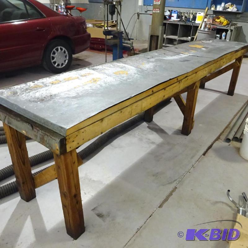 lot 53 image: Wood Work Bench 145 X 28 X 34 Metal Top...