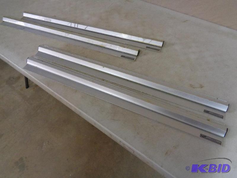 lot 32 image: Qty 4 Aluminum order ticket holders