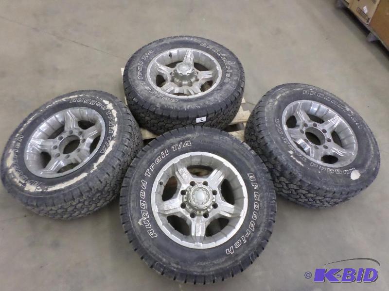 lot 1 image: (4) Ford 8-Lug 17" Rims With BFGoodrich ...