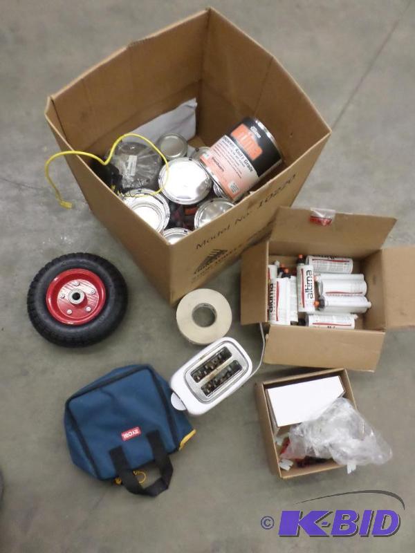 lot 29 image: Box Of Assorted Dolly Tire, Toaster, aDhesiv...