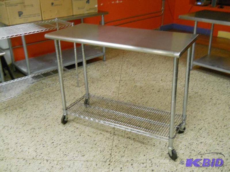 Rolling Stainless Steel Table With Undershelf. NSF.