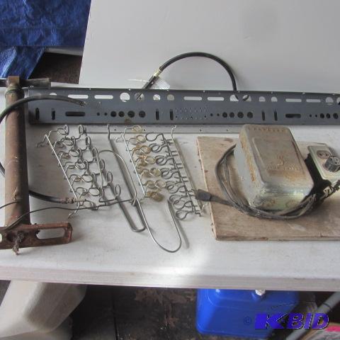lot 115 image: Time Clock, Hooks, Tire Pump