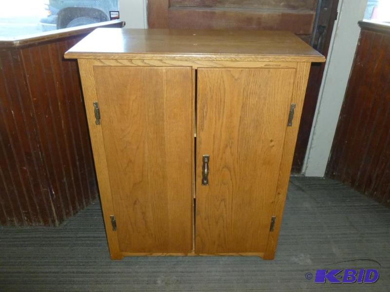 lot 12 image: Custom made oak roller wheel cabinet, measure...