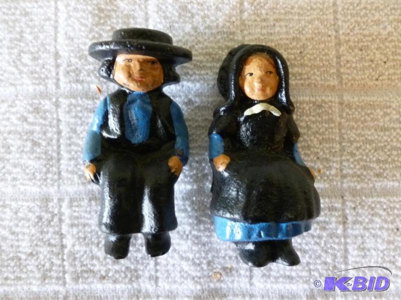 lot 133 image: Lot of two collectible cast iron amish figuri...