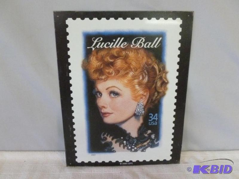 lot 139 image: Lucille Ball metal sign that measures 12"...